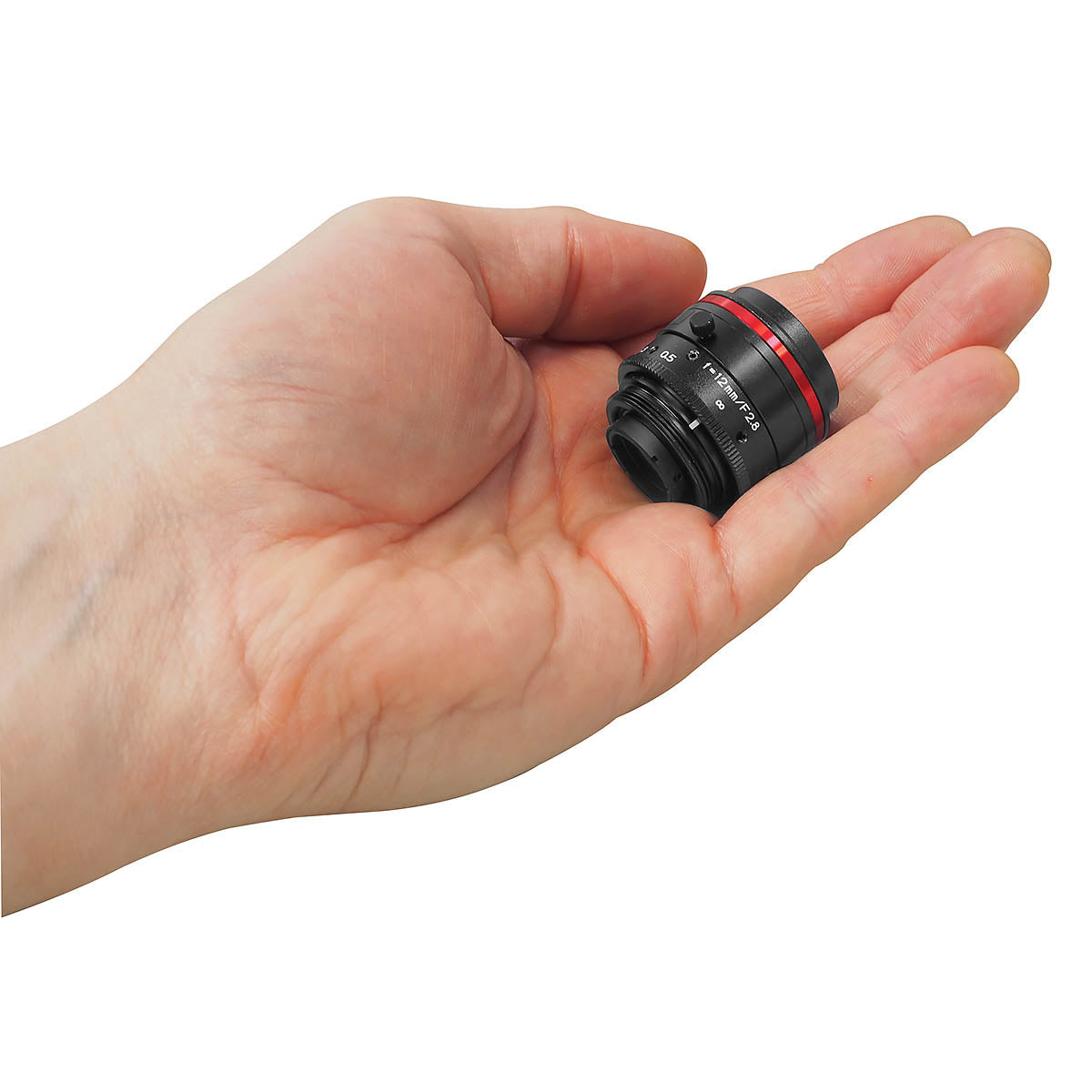 LM12JC5MC Compact Size Shown In Palm Of Hand