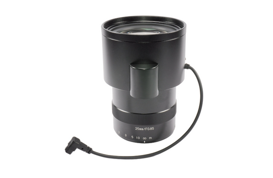 Black camera lens with a cable on a white background